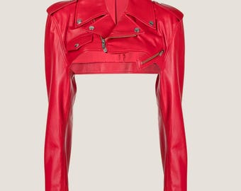 May include: A cropped red leather jacket with a zipper closure and multiple pockets.