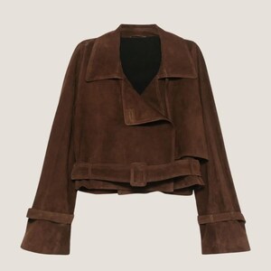 May include: A brown suede jacket with a wide collar, a belt at the waist, and cuffs at the sleeves. The jacket has a layered design and a black interior. The jacket is a stylish outerwear piece.