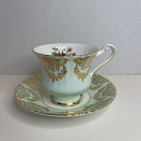 Antique Paragon Pink Rose Teacup and Saucer: Baby Blue with Gold Filigree