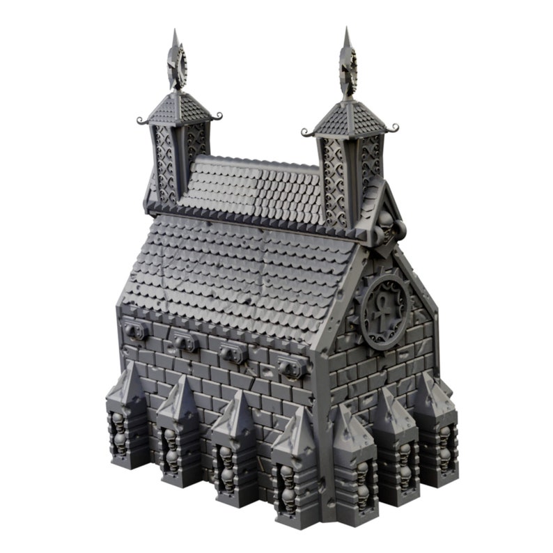 Op de afbeelding: Een grijs 3D-geprint model van een gotisch gebouw met een bakstenen gevel, een betegeld dak en twee torens. Het gebouw heeft een grote, sierlijke klok op de voorkant.
