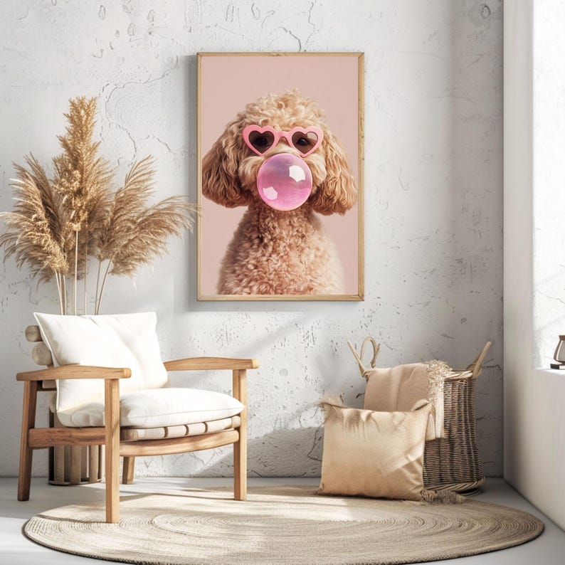 May include: A light brown poodle wearing pink heart-shaped sunglasses and blowing a pink bubble. The dog is against a light pink background.