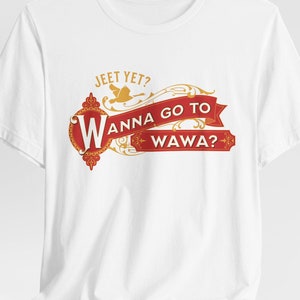 May include: White t-shirt with a red and gold graphic that says "Jeet Yet? Wanna Go To Wawa?"