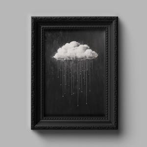 May include: A black framed picture with a white cloud and raindrops painted on a black background.