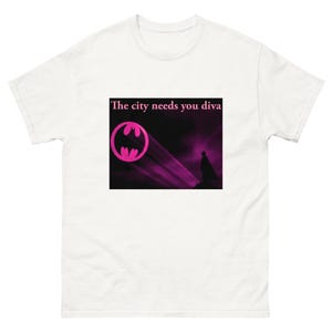 May include: White t-shirt with a pink Batman logo and the text "The city needs you diva".