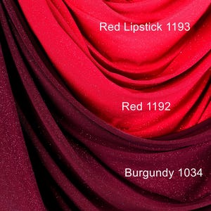 a close-up view of a fabric with red and burgundy colors, with the red fabric appearing to be a red lipstick shade and the burgundy fabric being a burgundy fabric.