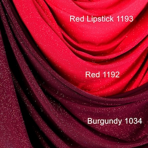 a close-up view of a fabric with red and burgundy colors, with the red fabric appearing to be a red lipstick shade and the burgundy fabric being a burgundy fabric.