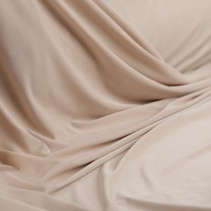 Tan 4-Way Stretch Knit Fabric: Soft Matte Polyester Spandex Blend
