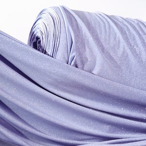 Tecido de malha azul jeans com glitter: elastano com elasticidade em 4 direções, material brilhante.
