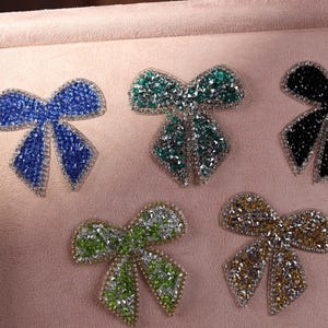 a close up of a box with a bunch of bows on it
