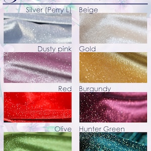 a bunch of different colors of fabric
