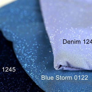 three fabric swatches, each with a different color and texture, including navy blue, blue storm, and denim 1241.