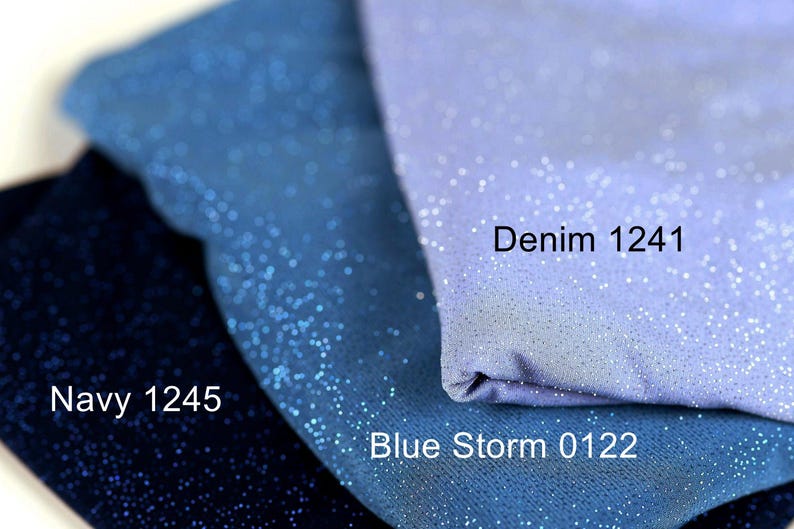 three fabric swatches, each with a different color and texture, including navy blue, blue storm, and denim 1241.