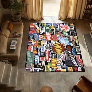 May include: A black and white rug with a collage of colorful words and phrases, including "WOW", "Win!" and "Coming Soon".