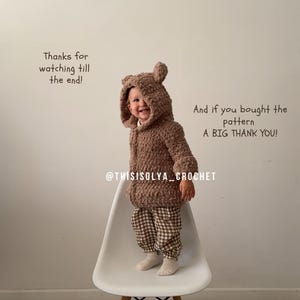 May include: A brown crocheted teddy bear hooded jacket with a white background. The text "Thanks for watching till the end!" and "And if you bought the pattern A BIG THANK YOU!" is written in brown text. The text "@THISISOLYA_CROCHET" is written in black text.