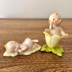 Super słodka figurka śpiącego dziecka Lefton Kewpie z 1985 r., figurka Enesco Kewpie z kwiatkiem, malowana ręcznie, wykonana na Tajwanie