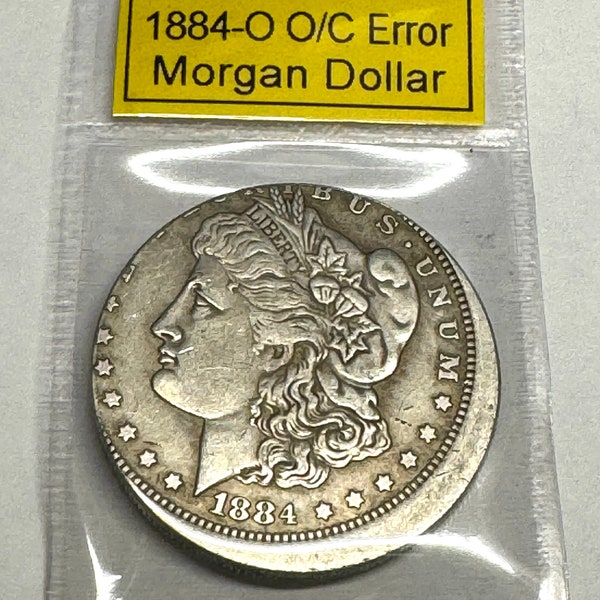 1884-O Off Center Error Morgan Dollar. Very Unique Looking Coin. See complete item description below.