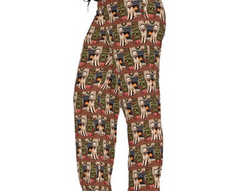 May include: Brown pajama pants with a repeating pattern of golden doodle dogs sitting in front of a fireplace with a Christmas tree.