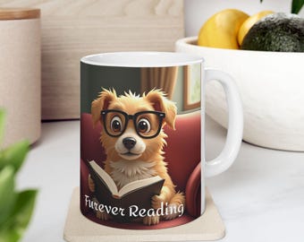May include: White ceramic mug featuring a cartoon dog wearing glasses and reading a book. The dog is light brown with black glasses. The mug has the text "Furever Reading" on it. The mug is sitting on a beige coaster.