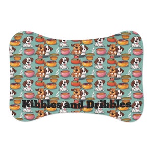 Kibbles and Dribbles dogs with dog food bowls as a cartoon dog food and water mat, rescue dog gift idea, fun dog food and water mat