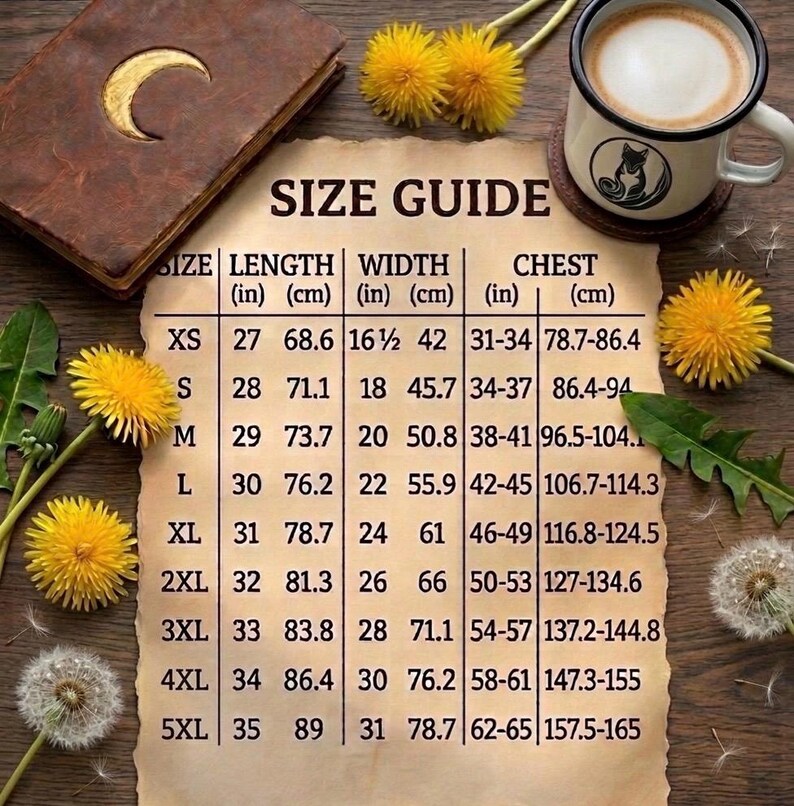 May include: A size guide chart with measurements in inches and centimeters. The chart includes sizes XS to 5XL, with length, width, and chest measurements. The image is on a wooden surface, with a cup of coffee and a book.