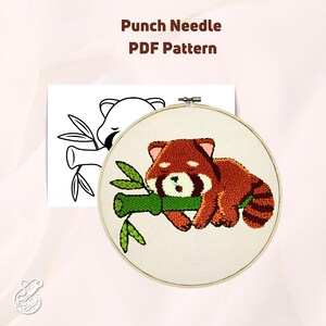May include: Punch needle pattern for a red panda sleeping on a bamboo branch. The pattern is in black and white and is ready to be stitched.
