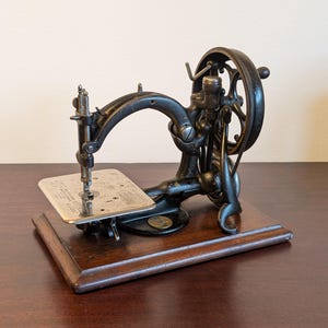1888 Willcox & Gibbs antieke handnaaimachine gietijzer
