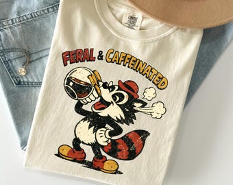 Feral & Caffeinated Raccoon Shirt, Funny Coffee Graphic Tee, Vintage Raccoon T-Shirt, Comfort Colors® Unisex Casual Top