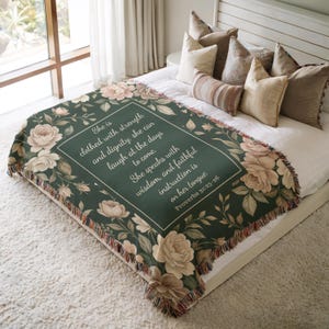 Bible verse blanket with floral design and customizable scripture text, woven throw perfect for prayer time and spiritual home decor.