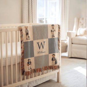 Custom woven sports teddy blanket for boys nursery decor featuring patchwork storybook bears, personalized keepsake baby shower gift.