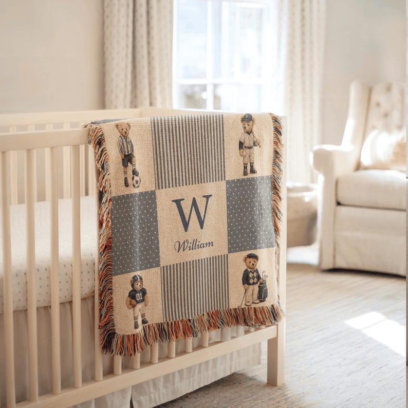 Custom woven sports teddy blanket for boys nursery decor featuring patchwork storybook bears, personalized keepsake baby shower gift.