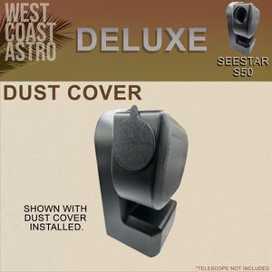 May include: A black dust cover for a Seestar S50 telescope. The cover is circular with a small tab at the top, shown installed on the front of the black telescope unit. Text on the image reads West Coast Astro, Deluxe, Seestar S50, Dust Cover.