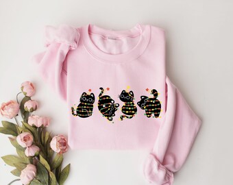 Meowy Christmas Cat Shirt, Black Cats Christmas Sweatshirt, Cats Christmas Lights Tee, Cute Cat Christmas Lights Shirt, Cat Lover Shirt
