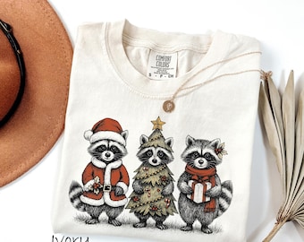 Comfort Colors® Cute But Feral Christmas Raccoon Shirt, Christmas Season Feral Raccoon Shirt, Christmas Shirt, Funny Raccoon Meme Shirt