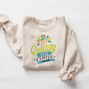 Quality Learing Center Logo Tee, Funny Republican Humor Childcare T-Shirt, Funny Parody T-Shirt Sweatshirt Hoodie, Retro Humor Graphic