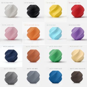May include: A collection of matte-finish, spiral-shaped decorative objects in various colors. Colors include ivory white, charcoal, yellow, scarlet red, sakura pink, mandarin orange, ice blue, lilac purple, dark blue, terracotta, grass green, dessert sand, nardo grey, ash grey, marine blue, and dark chocolate.