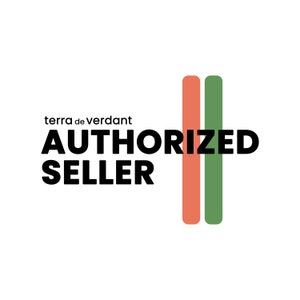 May include: White background with the text "terra de verdant AUTHORIZED SELLER" in black. Two vertical stripes, one coral and one green, are positioned to the right of the text. The logo is simple and modern.