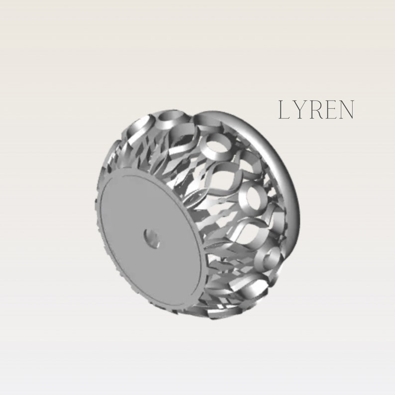 May include: A silver-colored, decorative object with a circular base and a detailed, openwork design. The object has a series of interconnected, leaf-like shapes and circular openings. The word "LYREN" is printed in a simple font on the right side.