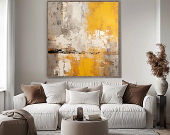 May include: Large abstract painting with a textured surface, featuring a blend of yellow, gray, and white hues. The artwork is displayed above a white sofa with brown and white pillows, creating a modern living room setting.