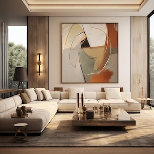 Puede incluir: Un salón moderno con una gran pintura abstracta con acentos naranjas, beige y negros. Un gran sofá esquinero blanco se encuentra sobre una alfombra de tonos neutros. Una mesa de centro cuadrada exhibe objetos decorativos.