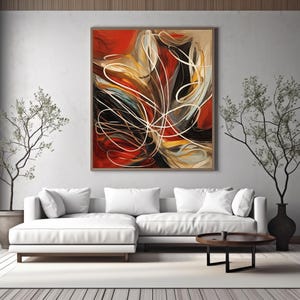May include: Abstract art print in a wooden frame. The artwork features a dynamic composition of swirling white lines against a backdrop of red, black, and beige hues. The painting hangs above a white sectional sofa and a round coffee table.