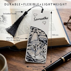 May include: A white rectangular bookmark featuring a black and white illustration of a cat, the name Samantha, and two heart outlines. It includes a black tassel, measures 150 mm by 50 mm, and has an ultra-thin profile of 1.5 mm thickness.