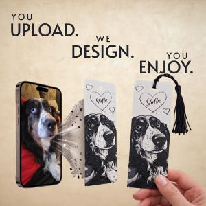 May include: A smartphone displaying a photo of a black and white dog next to two rectangular bookmarks featuring a black and white illustration of the same dog with a heart and the text Stuffie. One bookmark includes a black tassel.
