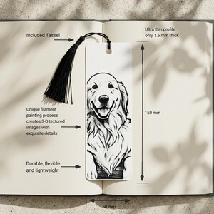 May include: A white rectangular bookmark featuring a black and white illustration of a dog. The bookmark includes a black tassel, measures 150 mm in height and 50 mm in width, and has an ultra thin profile of 1.5 mm thickness with a 3-D textured surface.
