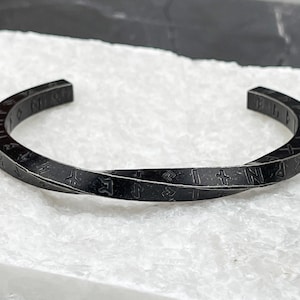 Norse and Celtic-inspired bracelets for men: Viking bangle with runes, torc, and Celtic cuff