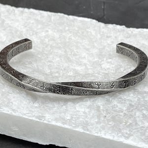 Norse and Celtic-inspired bracelets for men: Viking bangle with runes, torc, and Celtic cuff