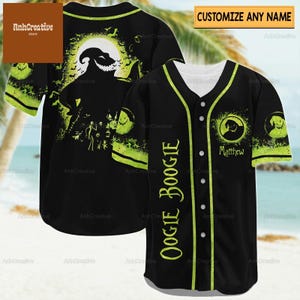 May include: Black and green baseball jersey with a green and white graphic of Oogie Boogie from The Nightmare Before Christmas. The jersey has a white collar and sleeves, and the text "Oogie Boogie" is printed on the right sleeve. The text "Matthew" is printed on the front of the jersey.