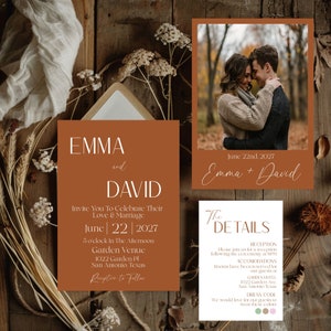 May include: A wedding invitation suite in a rustic brown and white colour scheme. The invitation features the names Emma and David, the date June 22nd, 2027, and the location of the wedding. The details card includes information about the reception, accommodation, and dress code.
