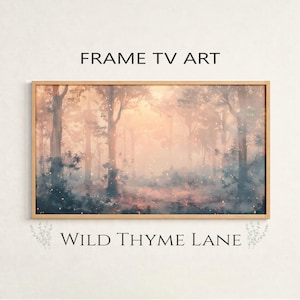 Peut inclure: Une œuvre d'art encadrée représentant une scène de forêt brumeuse aux tons chauds d'orange, de rose et de bleu. L'image a une qualité douce et éthérée. Le texte sur l'image indique "FRAME TV ART" et "WILD THYME LANE."