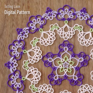 May include: A detailed digital pattern of tatting lace in white, purple, and green hues. The design includes the text "Tatting Lace Digital Pattern". The lace is displayed on a wooden surface, showcasing the delicate craftsmanship of the pattern.