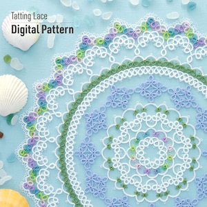 May include: A white tatting lace doily with a multi-colored border. The doily has a circular design with a center that features a repeating pattern of small flowers. The doily is on a light blue background. "Tatting Lace Digital Pattern" is written in black text at the top of the image.
